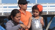 little-girl-with-orange-bow-striped-dress