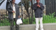 two-colorful-umbrella-men