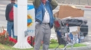 thumbs_homelesscombinghishair-1