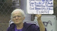 62-years-old-homeless-woman-sign