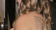 girl-with-tatoo-story-of-love-on-back